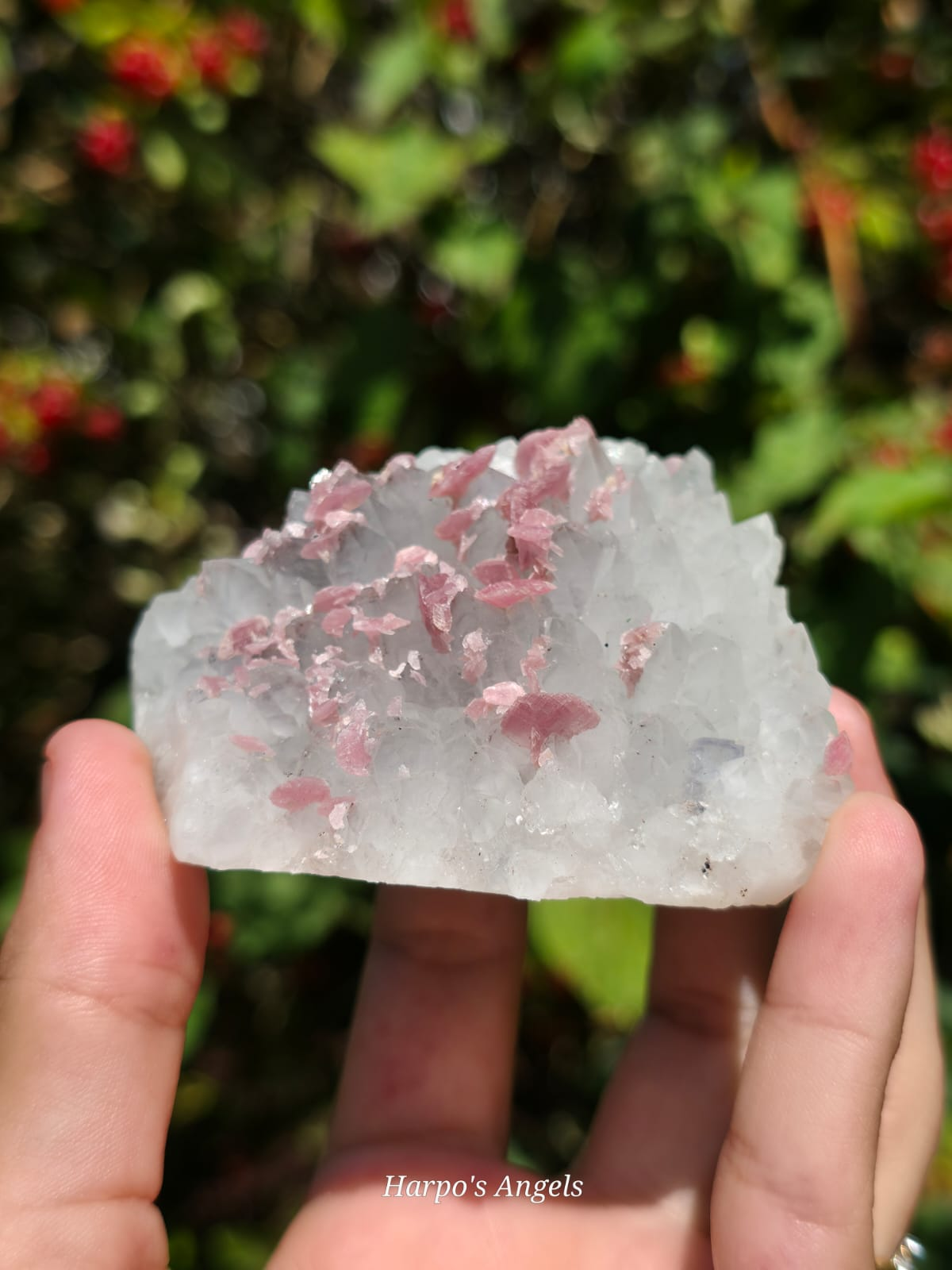 Rhodochrosite on Quartz with Fluorite