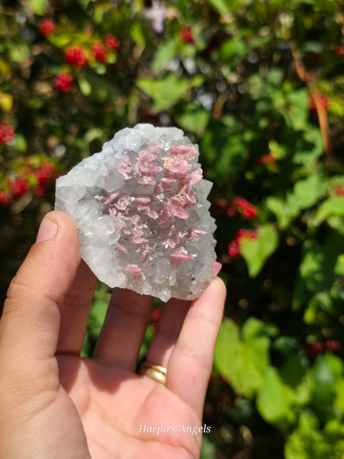 Rhodochrosite on Quartz with Fluorite